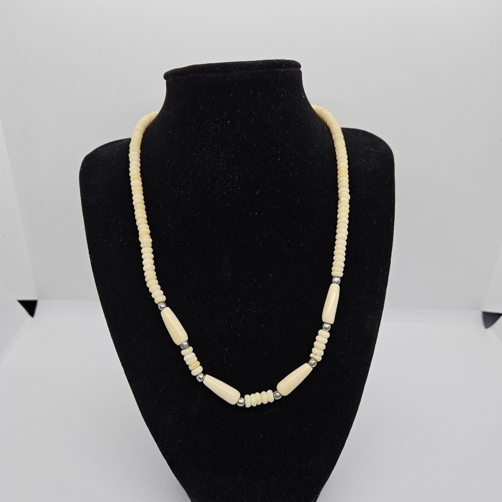 bone bead necklace with silver tone separators